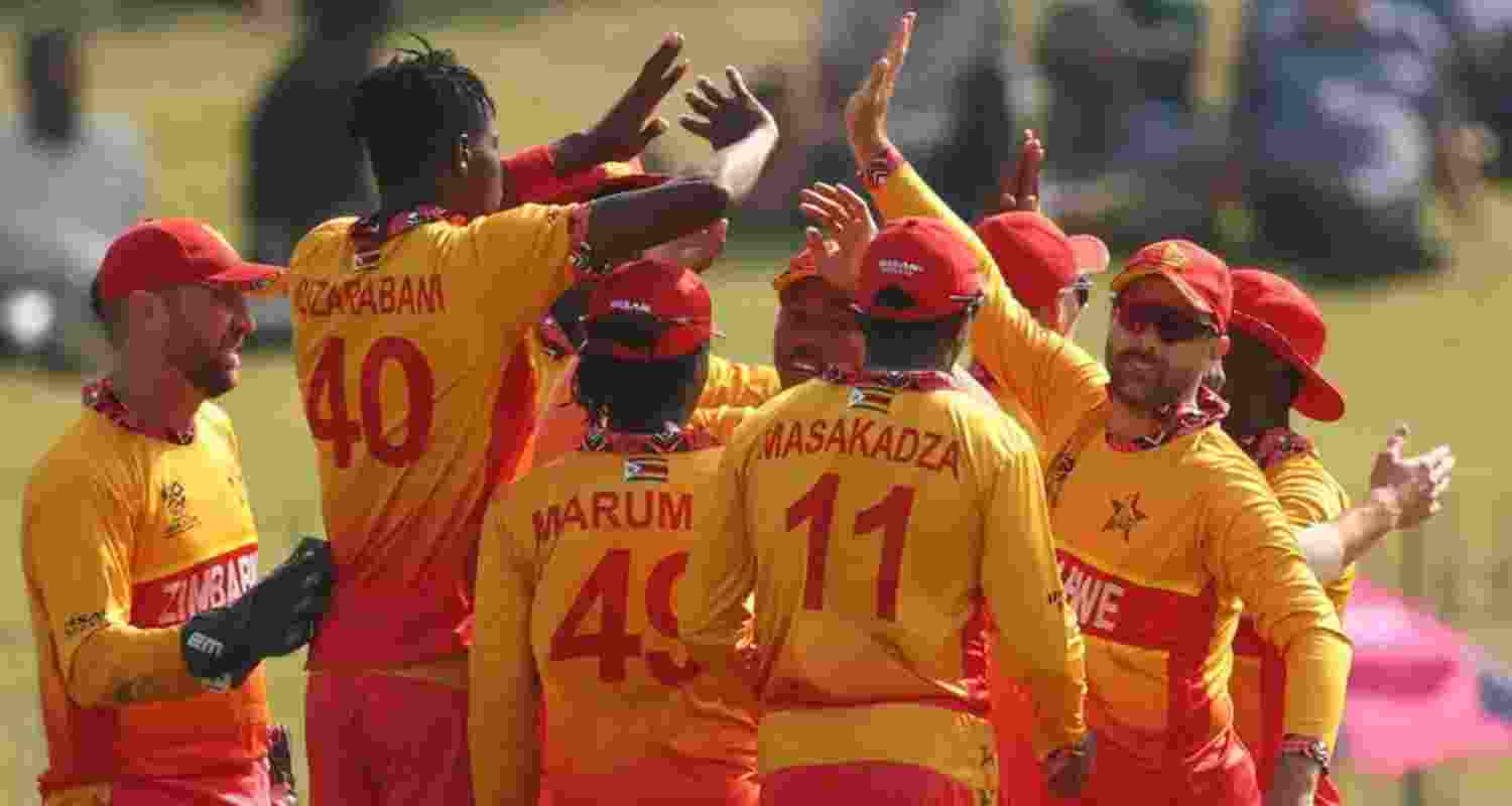 Zimbabwe players celebrating a dismissal against Oman in Colombo on Monday.