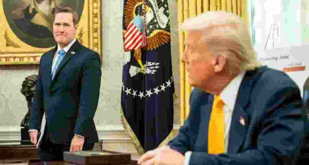 President Trump (R) has refused to sack National Security Adviser Mike Waltz (L) despite growing calls for his dismissal over a security lapse involving a leaked discussion on airstrikes in Yemen.