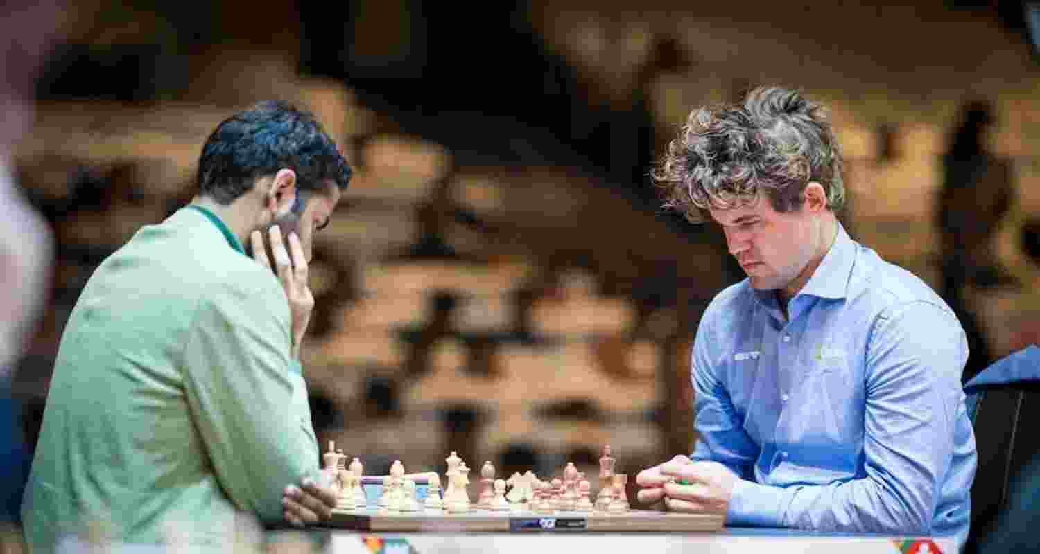 Arjun Erigaisi and Magnus Carlsen in action for Tata Steel Chess tournament. Image: X.