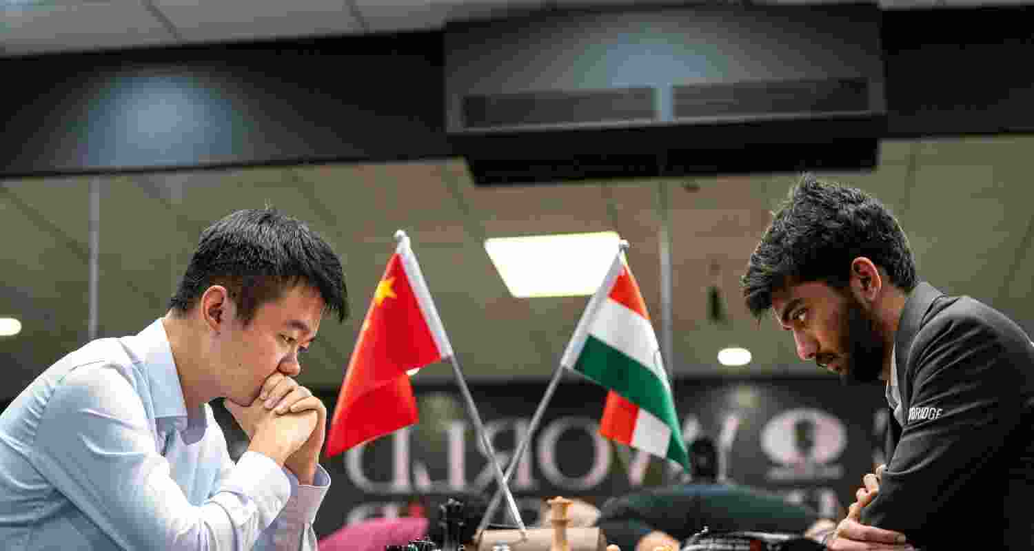 Ding Liren and D Gukesh. Image: FIDE/X. 