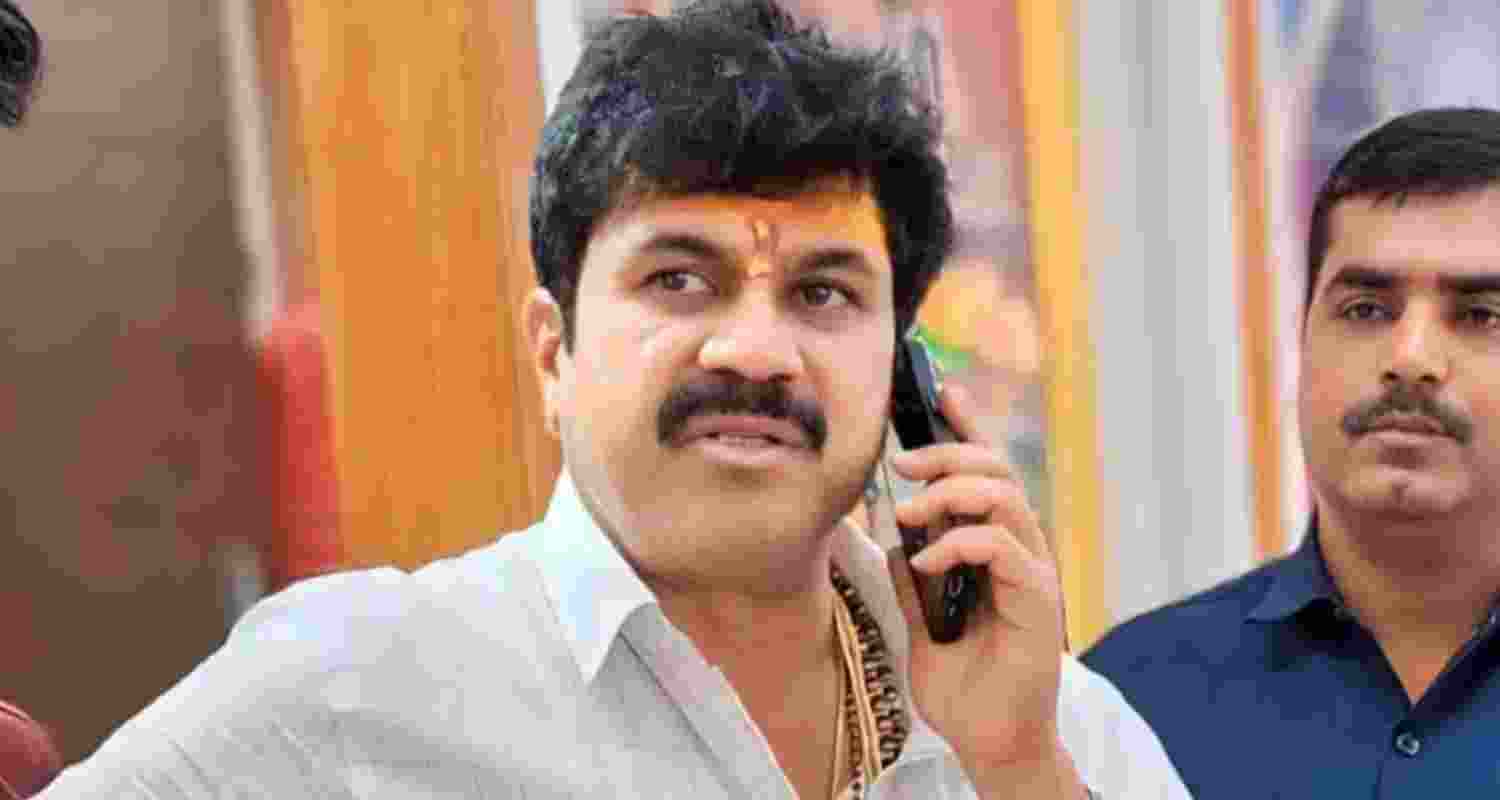 Beed Sarpanch murder suspect Walmik Karad surrenders to CID team. Image - Walmik Karad.