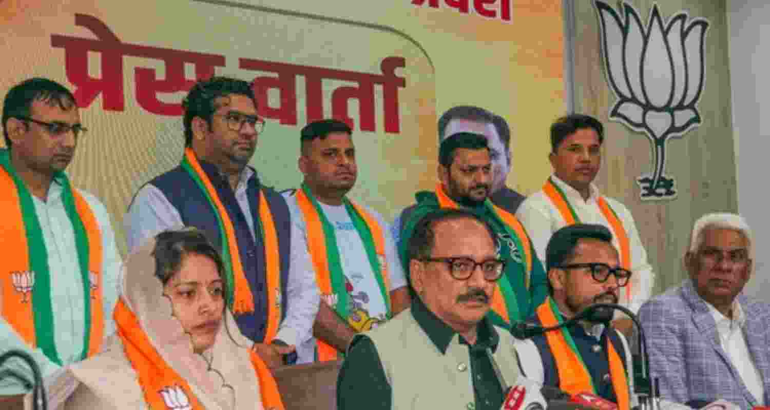 BJP gains strength as three AAP councillors switch sides.