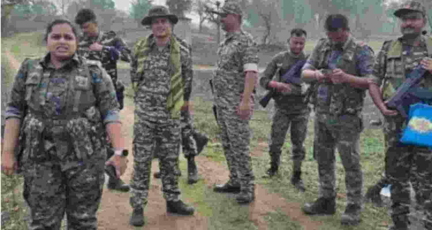 Palamu SP Reeshma Rameshan along with security personnel at the encounter site on Tuesday.