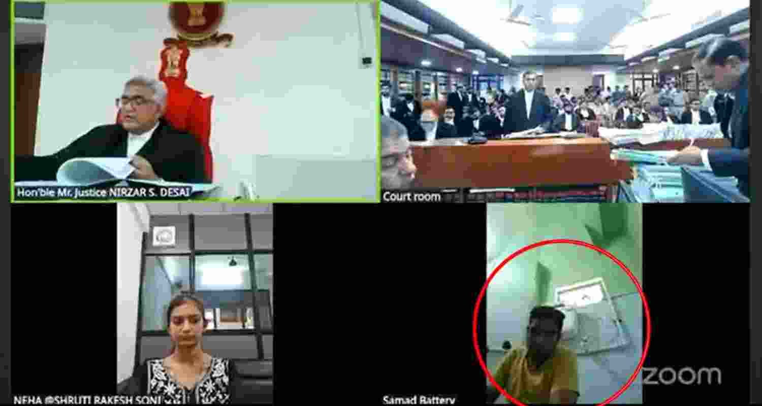 Gujarat man logs in from toilet during court hearing. Gujarat man logs in from toilet during court hearing.