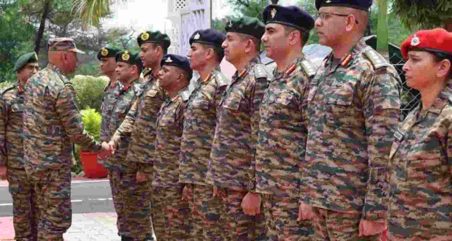 Lt Gen Pratik Sharma (L) meets officers in Jammu 