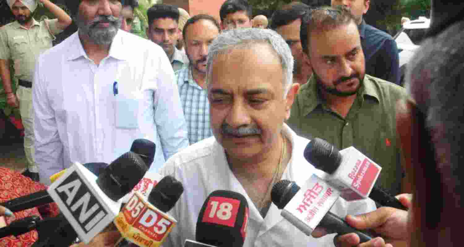 Former Punjab DGP Sidharth Chattopadhyaya speaks with the media after recording his statement before the VB
