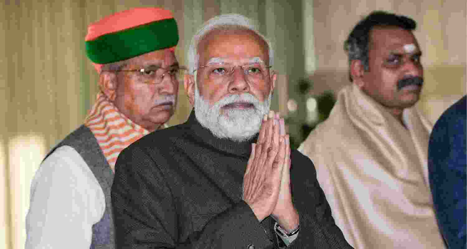 Prime Minister Narendra Modi arrives for NDA Parliamentary Party meeting, at Parliament premises in New Delhi, Tuesday.