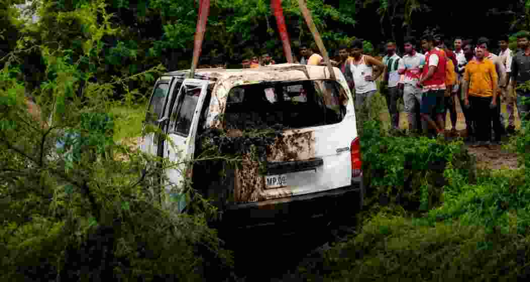 The van was swept away by strong currents while attempting to cross a swollen drain near Padana bypass in Rajgarh, Madhya Pradesh.