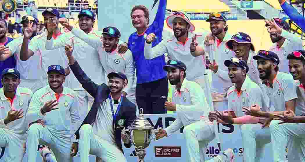 Vidarbha players celebrate their 93-run victory over Rest of India in the Irani Cup.