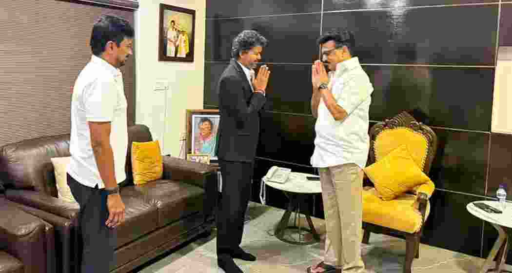 Tamil Nadu Chief Minister C Joseph Vijay greets DMK president MK Stalin as Udhayanidhi Stalin looks on during a meeting at Stalin’s Alwarpet residence in Chennai on Monday.