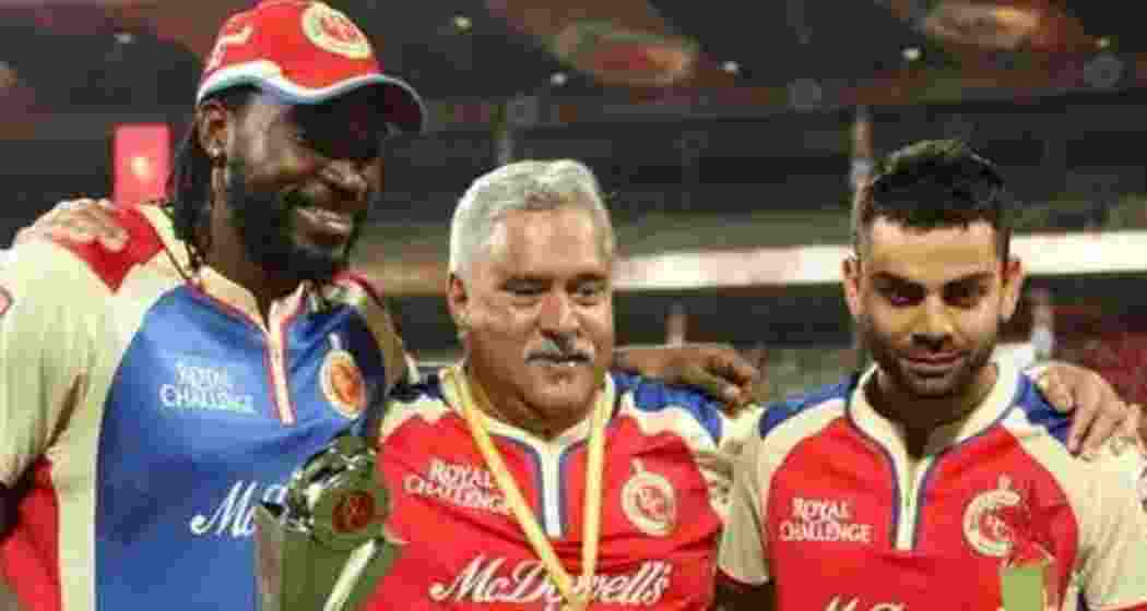 Vijay Mallya with Chris Gayle and Virat Kohli during an IPL match, when all three were the face of Royal Challengers Bangalore.