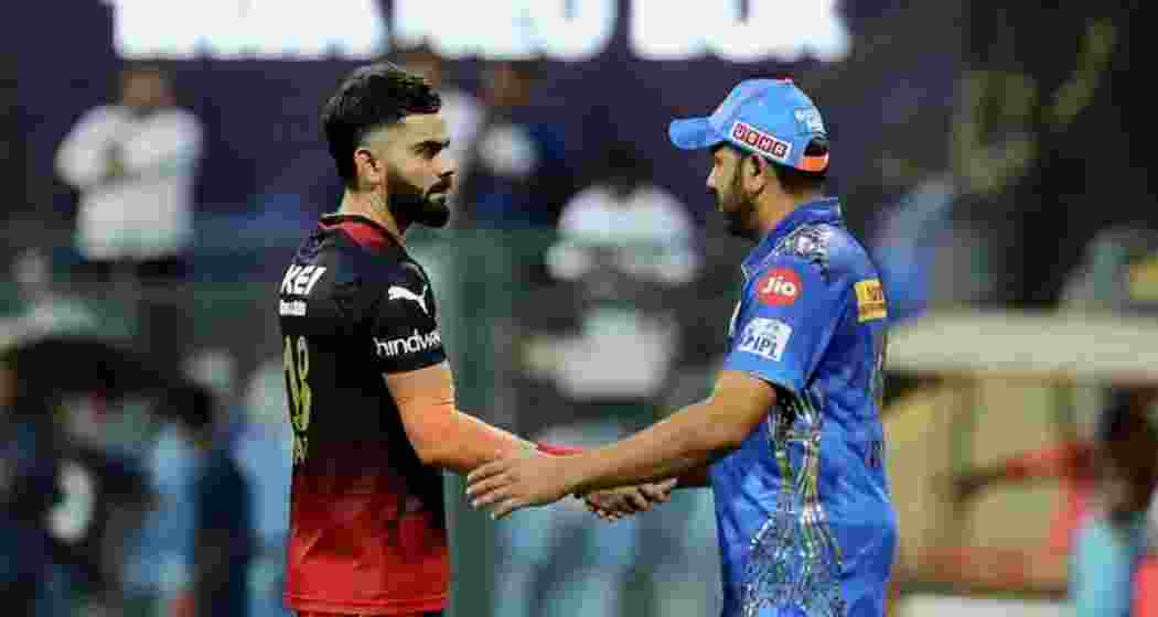 Royal Challengers Bengaluru’s Virat Kohli and Mumbai Indians’ Rohit Sharma during an IPL match.