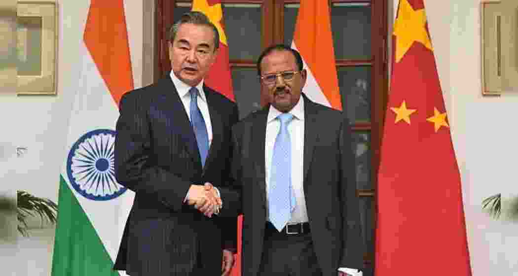 China’s Foreign Minister Wang Yi with India’s National Security Adviser (NSA) Ajit Doval.