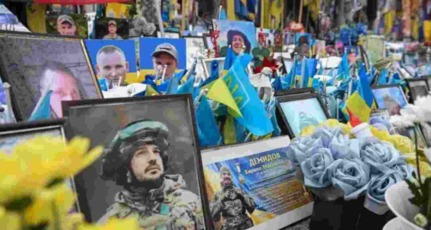 A file photograph of Ukrainians remembering their dead as the Russia-Ukraine war entered its fifth year.
