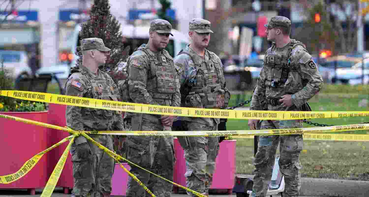 National Guard are seen after reports of two National Guard soldiers shot near the White House in Washington, Wednesday.