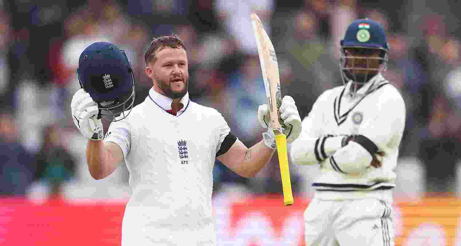 England’s Ben Duckett (left) celebrates after scoring a century on the last day of the first Test match between England and India at Headingley in Leeds on Tuesday.