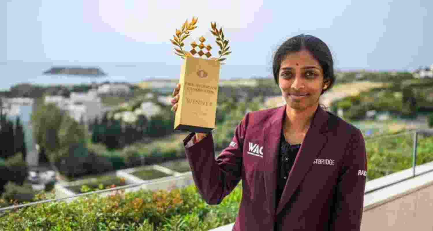 Vaishali with the winner's trophy after emerging on top in the FIDE Women's Candidates Tournament 2026.