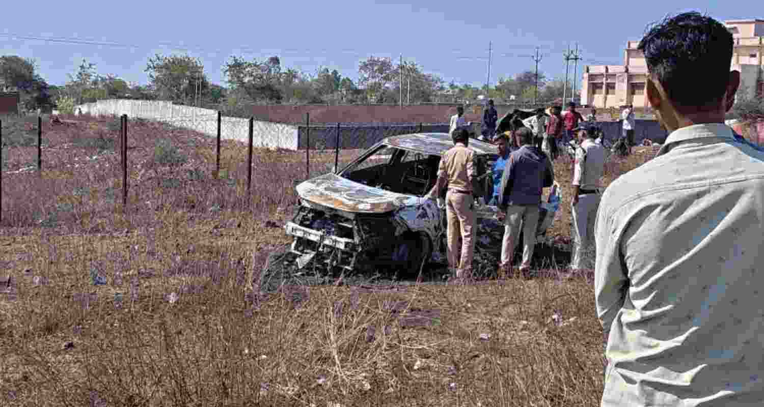 Woman dies after car catches fire near Sagar toll plaza; probe underway as family raises foul play suspicion in Madhya Pradesh incident.