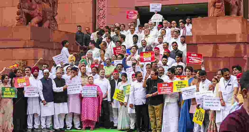 Opposition MPs stage a protest against the ongoing Special Intensive Revision (SIR) in Bihar, during the Monsoon session of Parliament, in New Delhi, Tuesday, July 22, 2025. 
