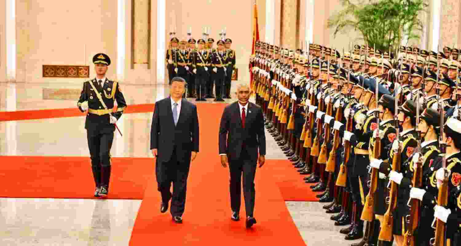 President of the People's Republic of China Xi Jinping (left) Maldives President Mohamed Muizzu (right).