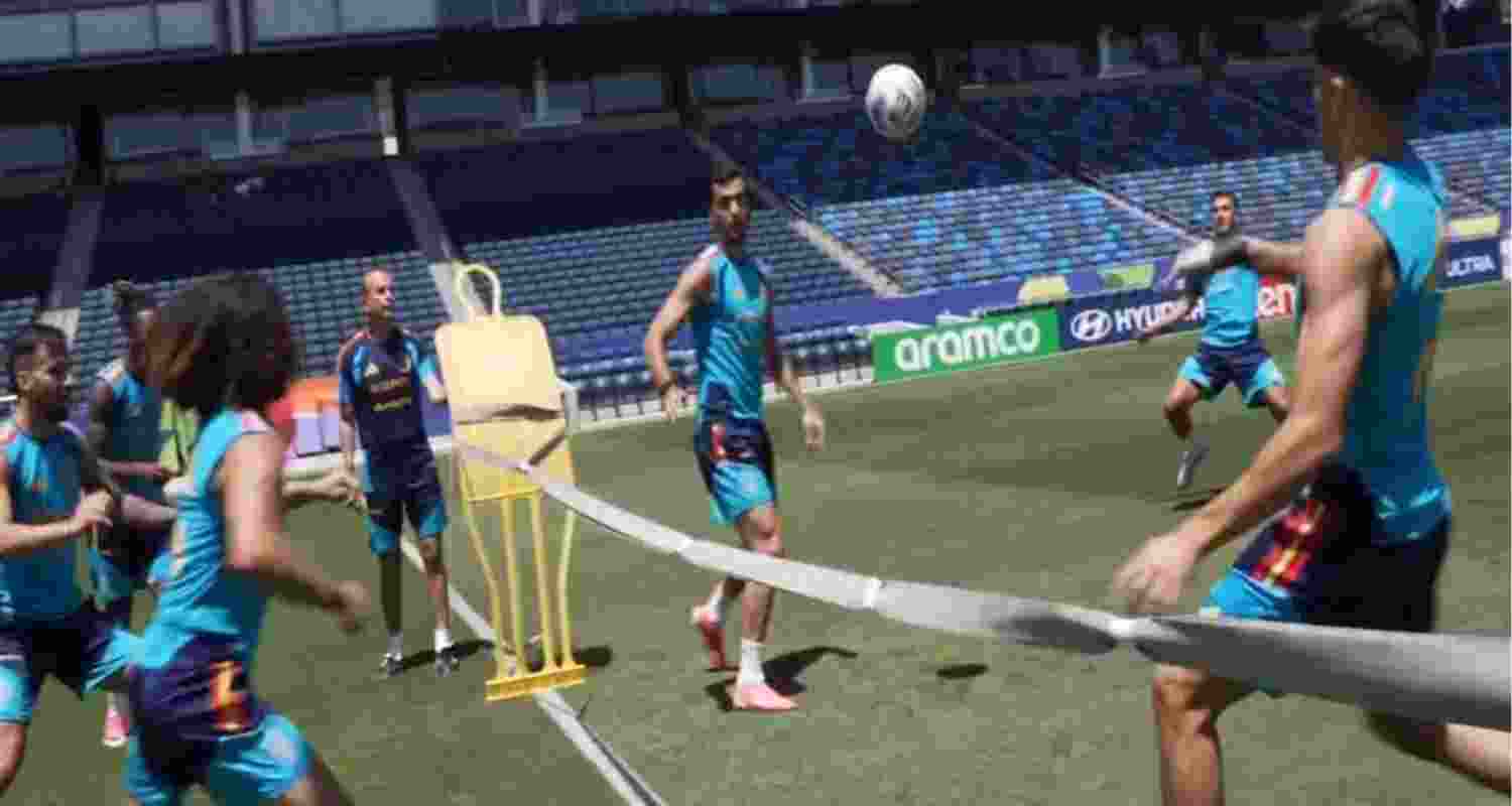  Spain playing a unique fusion of football and tennis during a training session ahead of their last 8 match.