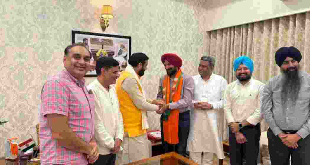 Haryana Chief Minister Nayab Singh Saini inducting former Akali leader Ranjit Singh Gill into the BJP in Chandigarh on Friday. 
