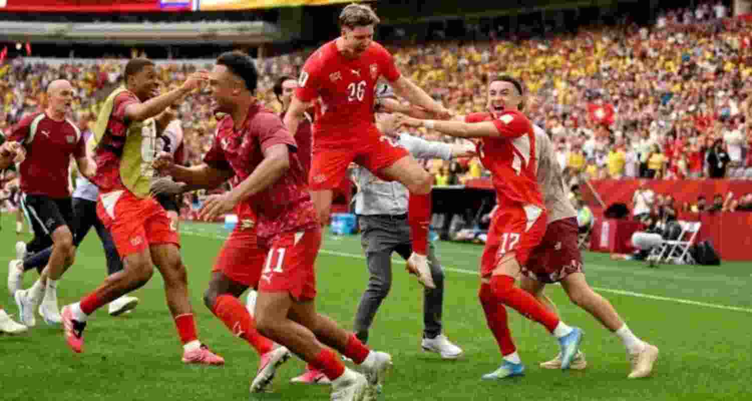 Swiss players celebrating their country's entry into the quarterfinals of the FIFA World Cup for the first time since 1954.