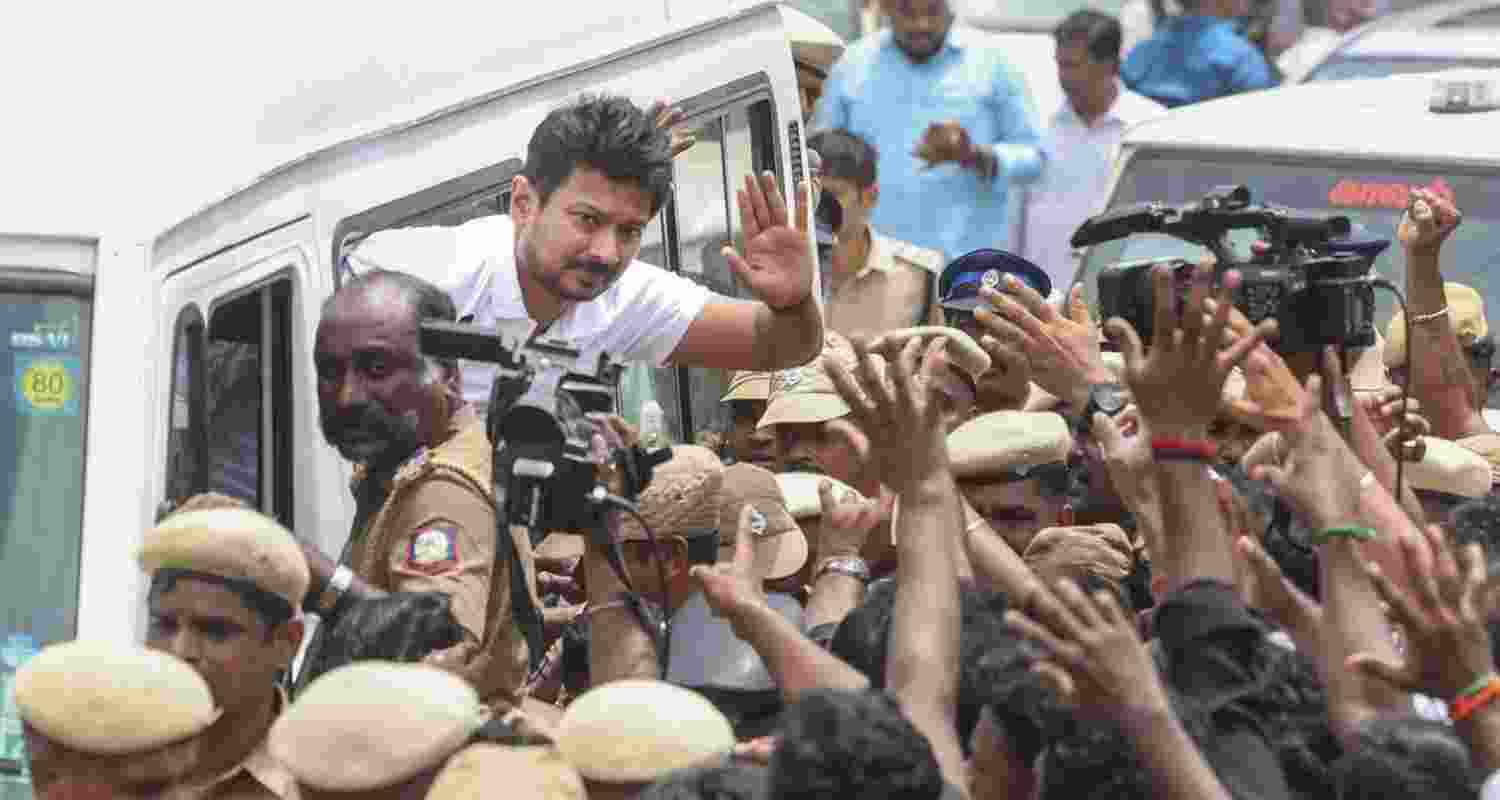 Former Tamil Nadu deputy chief minister Udhayanidhi Stalin waves at supporters after his arrest on Tuesday.