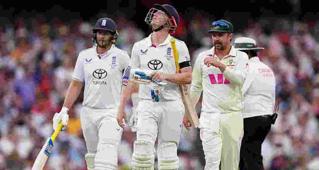 England’s Harry Brook and Joe Root, and Australia’s Travis Head, walk off the field after bad light stops play on day one of the fifth Ashes Test at the SCG. England’s Harry Brook and Joe Root, and Australia’s Travis Head, walk off the field after bad light stops play on day one of the fifth Ashes Test at the SCG.