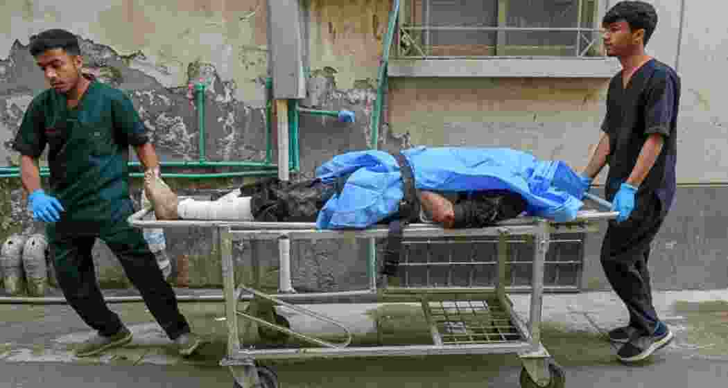 Paramedics shift an injured man at a hospital in Quetta following an attack by Baloch separatists. Paramedics shift an injured man at a hospital in Quetta following an attack by Baloch separatists.