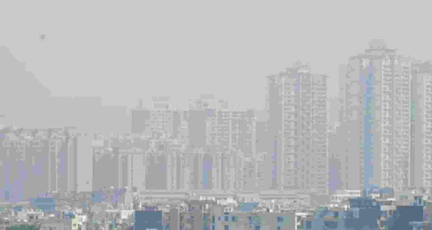 A view of skyscrapers in Noida city shrouded in thick smog on Friday afternoon, ahead of Diwali. Rising pollution levels have reduced visibility and worsened air quality across the Delhi-NCR region, in Noida. A view of skyscrapers in Noida city shrouded in thick smog on Friday afternoon, ahead of Diwali. Rising pollution levels have reduced visibility and worsened air quality across the Delhi-NCR region, in Noida.