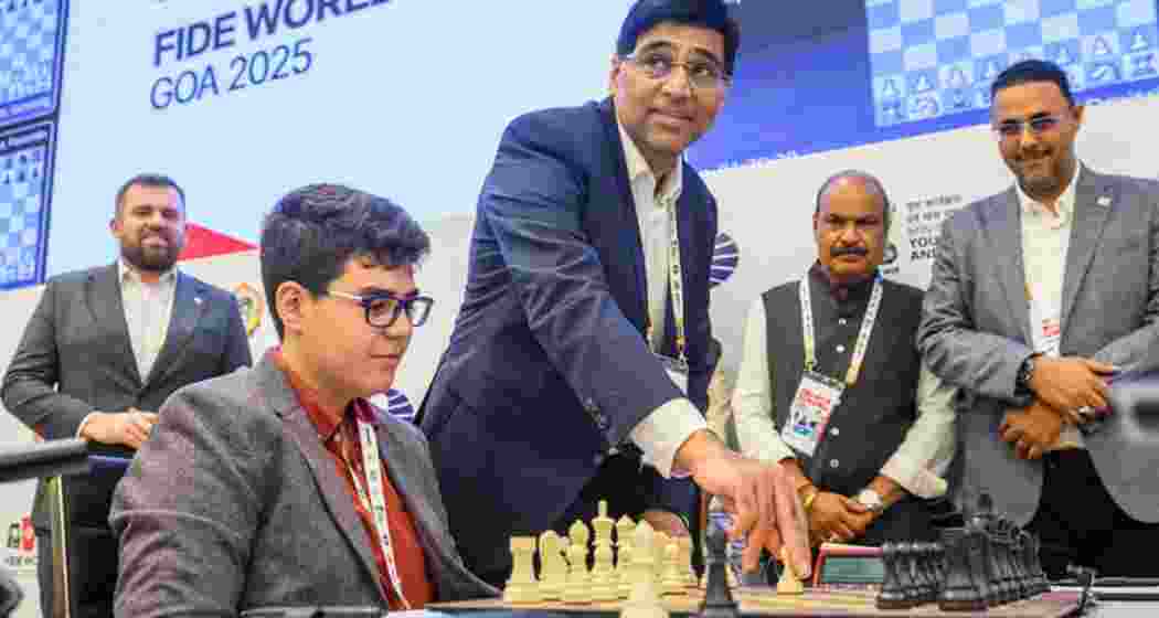 Five-time world champion Viswanathan Anand makes the opening move for top-seeded Yagiz Kaan Erdogmus during Round 1 in Goa. Five-time world champion Viswanathan Anand makes the opening move for top-seeded Yagiz Kaan Erdogmus during Round 1 in Goa.