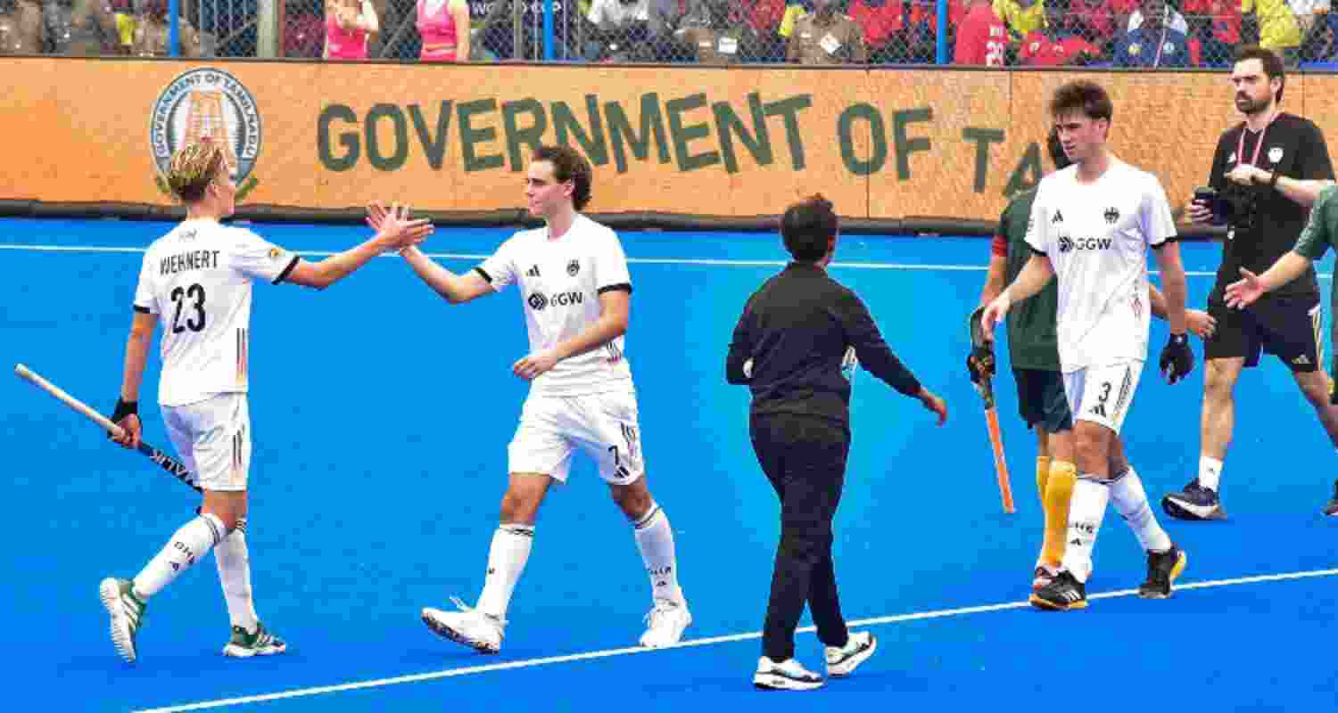 German and South African players exchange greetings after the inaugural match of the Men's Junior Hockey World Cup in Madurai on Friday. German and South African players exchange greetings after the inaugural match of the Men's Junior Hockey World Cup in Madurai on Friday.