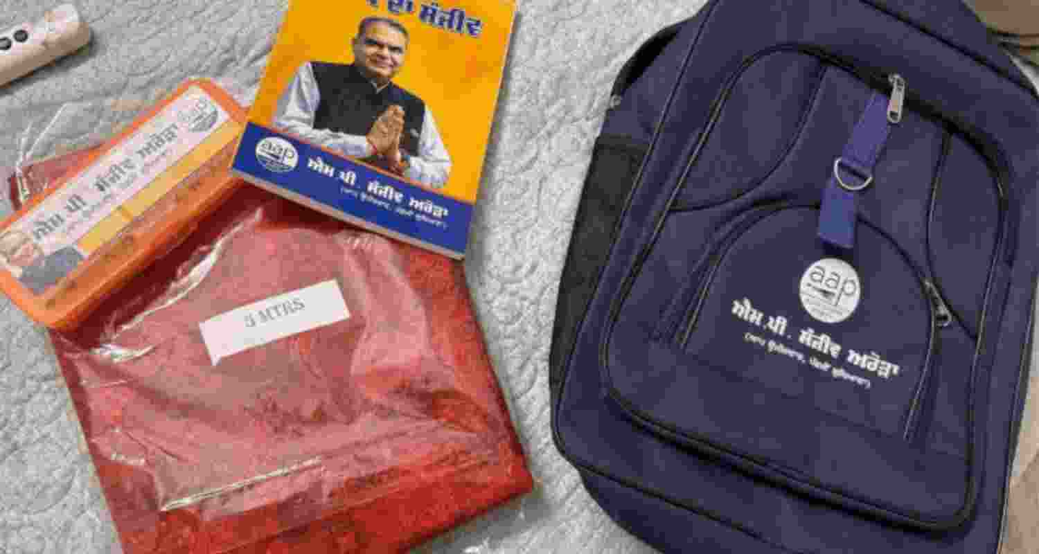 Freebies with AAP candidate picture and symbol allegedly distributed by the party. Freebies with AAP candidate picture and symbol allegedly distributed by the party.