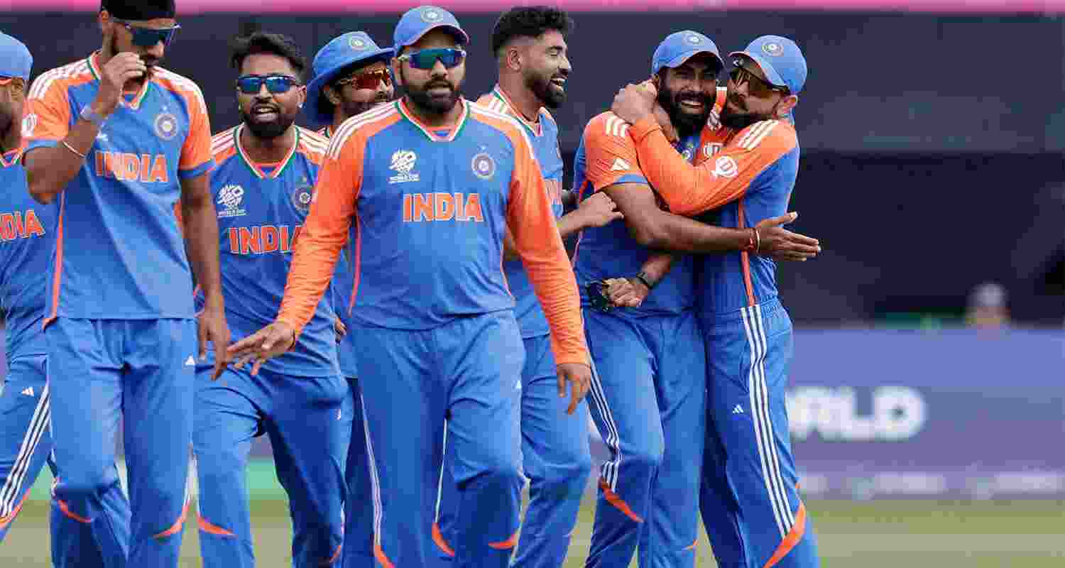 India's Jasprit Bumrah celebrates with his teammates. India's Jasprit Bumrah celebrates with his teammates.