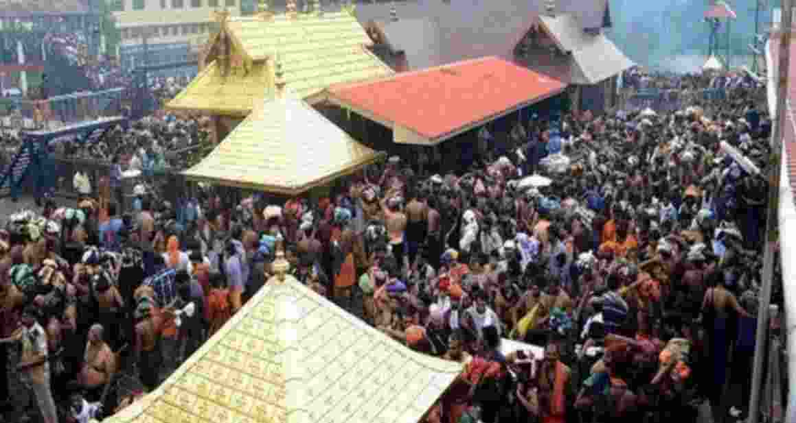 Devotees at Sabarimala temple. Devotees at Sabarimala temple.