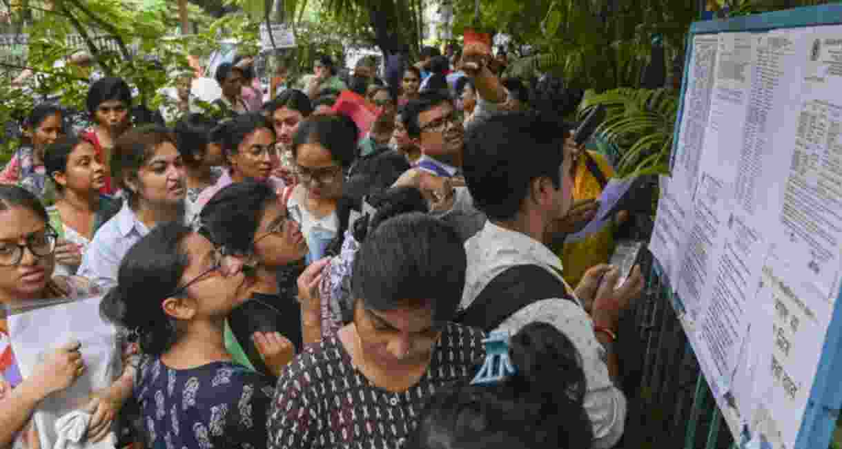 Candidates check their seating arrangements before appearing for a West Bengal School Service Commission’s (WBSSC) school staff recruitment examination, at an exam centre, in Kolkata, West Bengal - file image. Candidates check their seating arrangements before appearing for a West Bengal School Service Commission’s (WBSSC) school staff recruitment examination, at an exam centre, in Kolkata, West Bengal - file image.