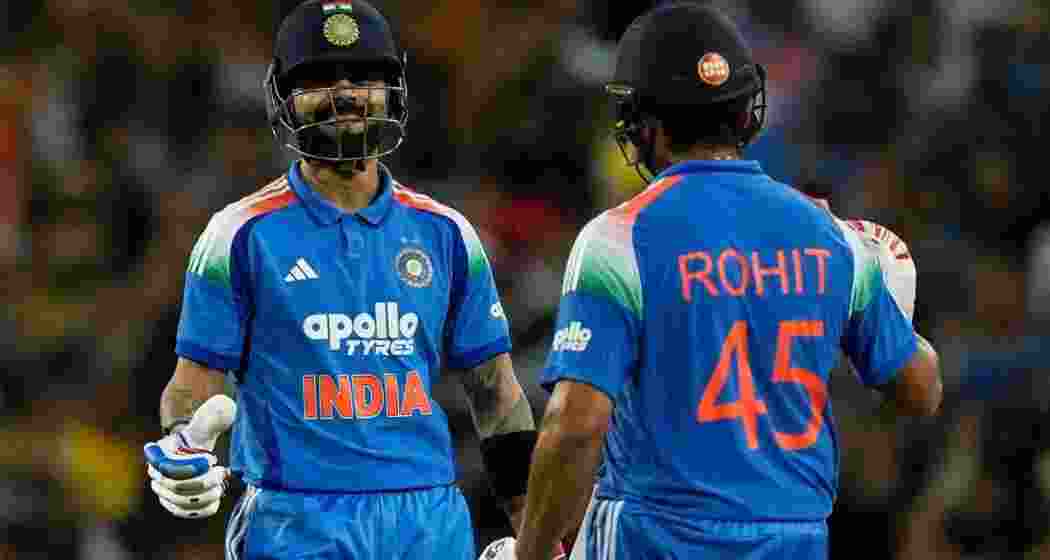 Rohit Sharma and Virat Kohli celebrate India’s emphatic 9-wicket win over Australia at Sydney Cricket Ground. Rohit Sharma and Virat Kohli celebrate India’s emphatic 9-wicket win over Australia at Sydney Cricket Ground.