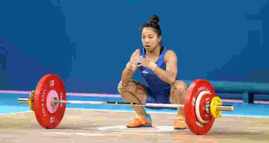 Mirabai Chanu in action during an international weightlifting competition. Mirabai Chanu in action during an international weightlifting competition.