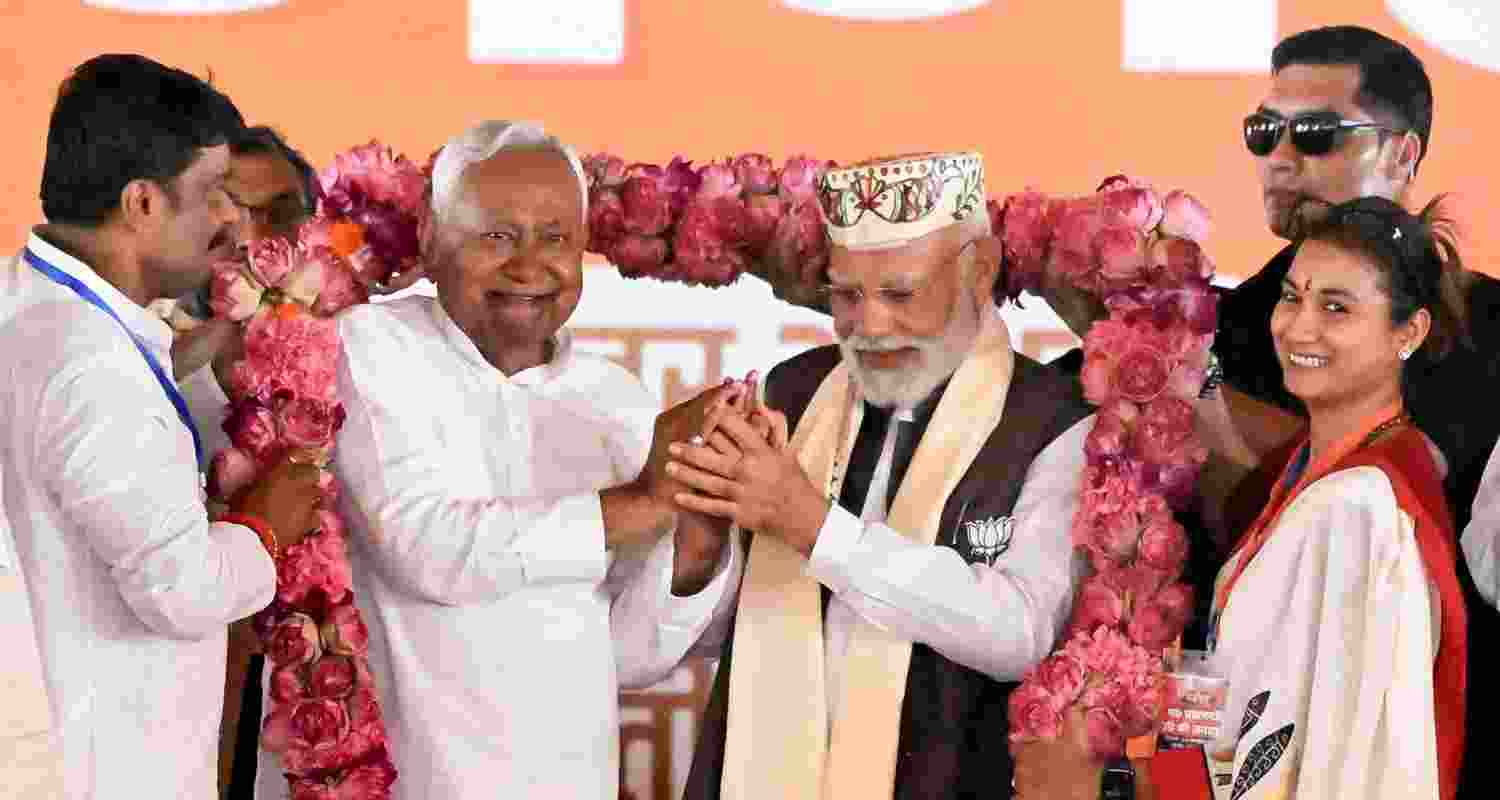 Prime Minister Narendra Modi and Bihar Chief Minister Nitish Kumar being garlanded during a public meeting ahead of the state Assembly elections, in Samastipur district, Friday. Prime Minister Narendra Modi and Bihar Chief Minister Nitish Kumar being garlanded during a public meeting ahead of the state Assembly elections, in Samastipur district, Friday.
