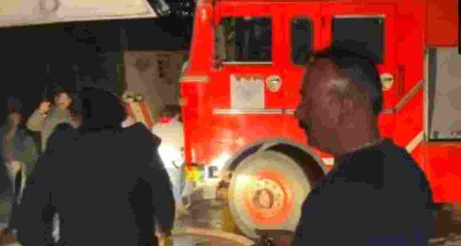 Officials trying to control the fire at Hotel Dhauladhar. Officials trying to control the fire at Hotel Dhauladhar.