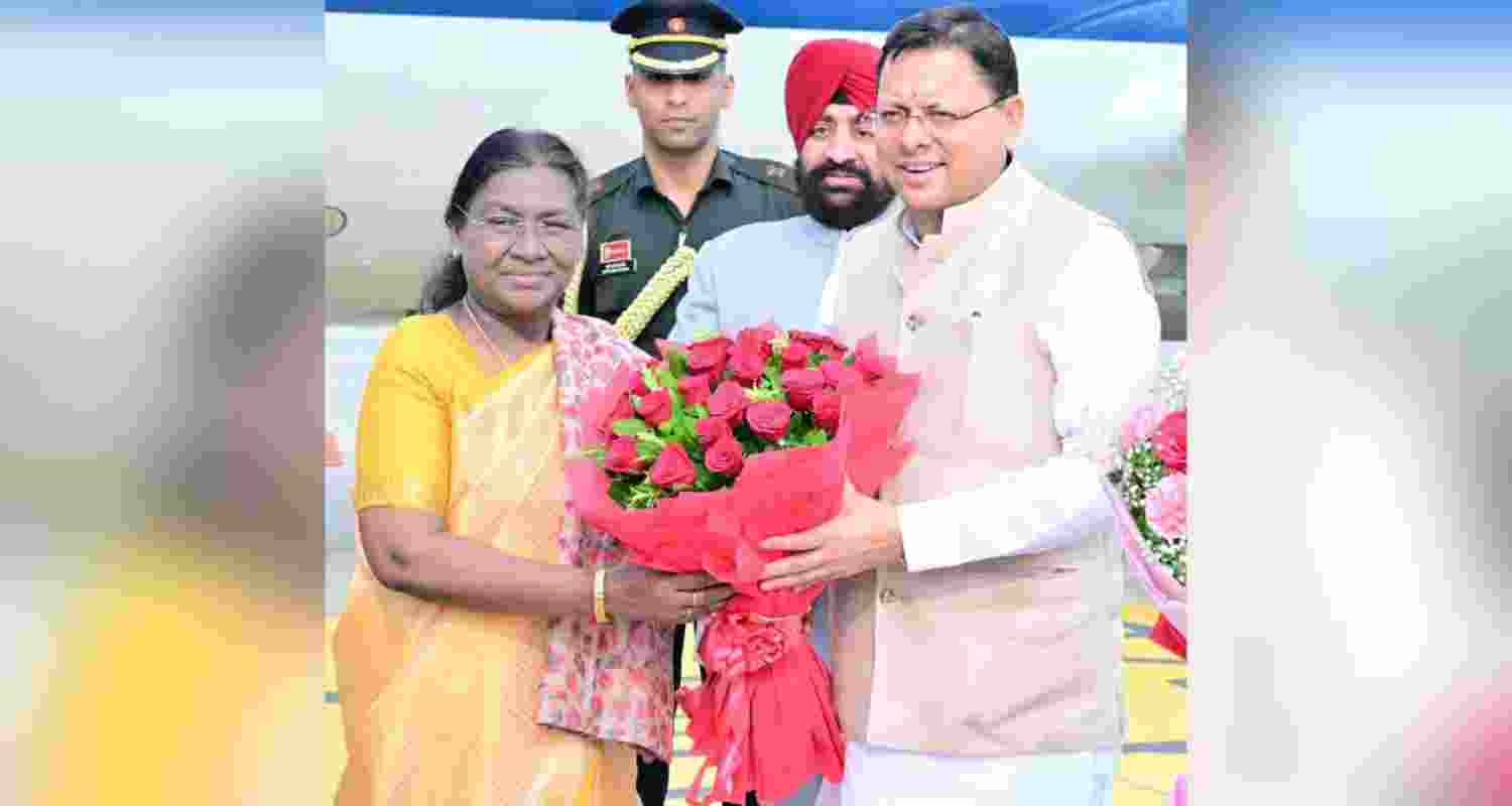 President Murmu being welcomed by Uttarakhand CM at Dehradun Airport. President Murmu being welcomed by Uttarakhand CM at Dehradun Airport.