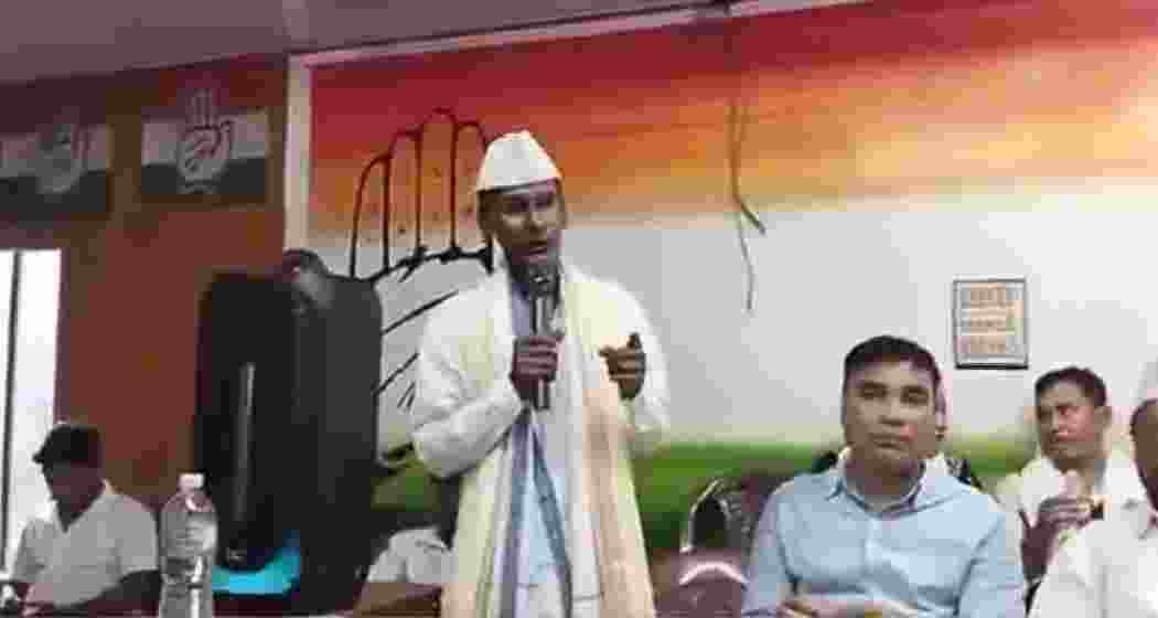 The Congress leader sings Bangladesh’s national anthem at a Seva Dal meeting in Assam, triggering a political row and prompting a government probe. The Congress leader sings Bangladesh’s national anthem at a Seva Dal meeting in Assam, triggering a political row and prompting a government probe.