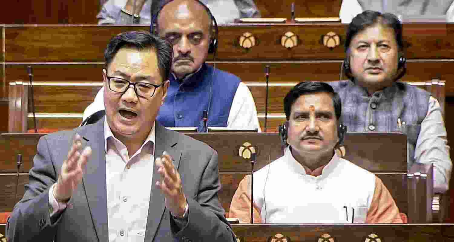 Union Minister Kiren Rijiju speaks during the Winter Session of Parliament, in New Delhi, Tuesday. Union Minister Kiren Rijiju speaks during the Winter Session of Parliament, in New Delhi, Tuesday.
