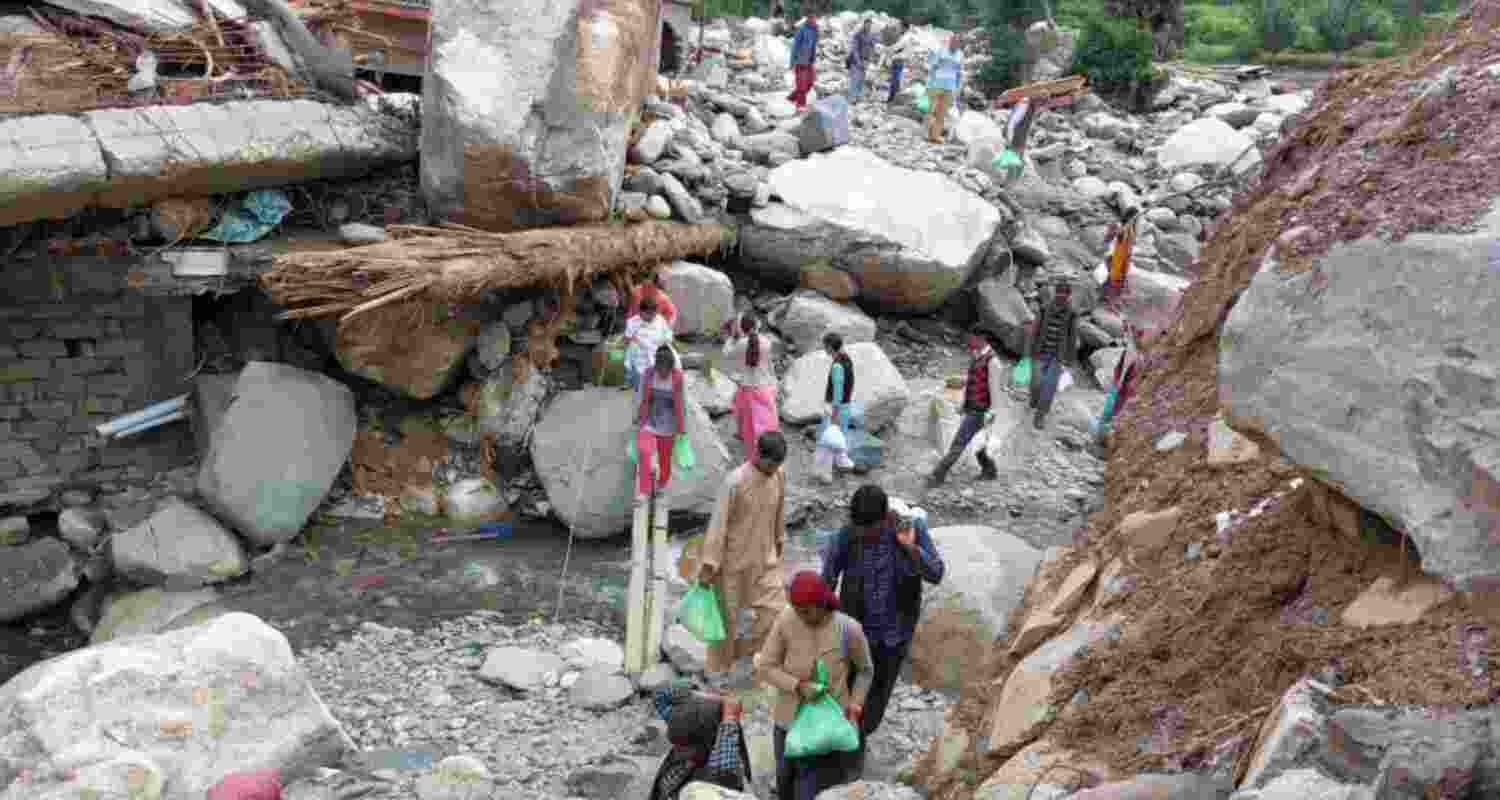 Seraj flood-hit families struggle to survive without cash. Seraj flood-hit families struggle to survive without cash.