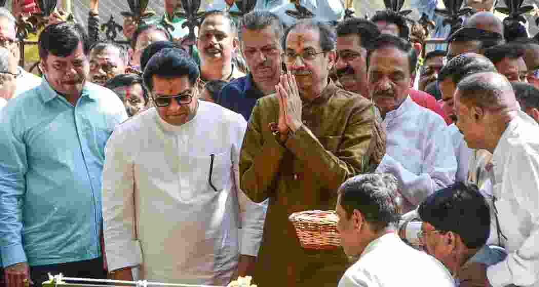 MNS chief Raj Thackeray and Shiv Sena (UBT) chief Uddhav Thackeray pay tributes at the memorial of Shiv Sena founder Bal Thackeray at Shivaji Park ahead of their alliance announcement. MNS chief Raj Thackeray and Shiv Sena (UBT) chief Uddhav Thackeray pay tributes at the memorial of Shiv Sena founder Bal Thackeray at Shivaji Park ahead of their alliance announcement.