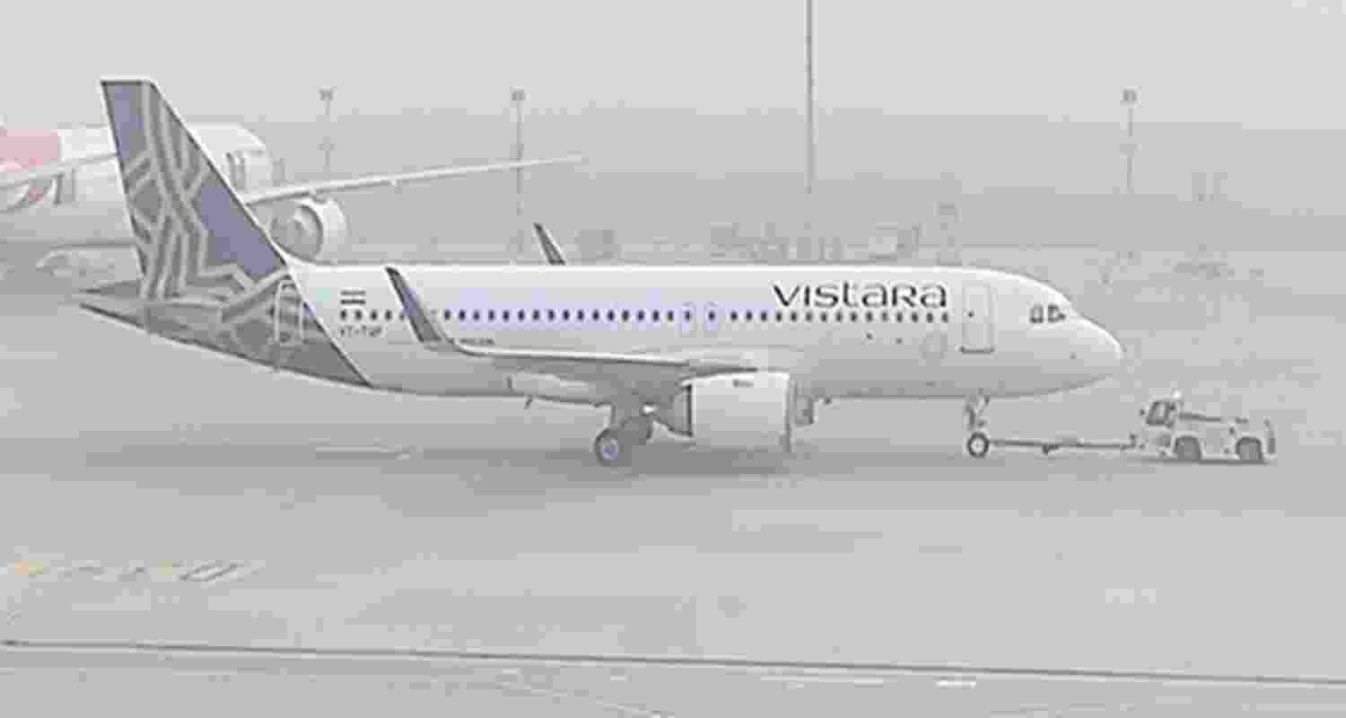 An aircraft waits to take off at the runway as dense smog reduce visibility and engulfs IGI airport. An aircraft waits to take off at the runway as dense smog reduce visibility and engulfs IGI airport.