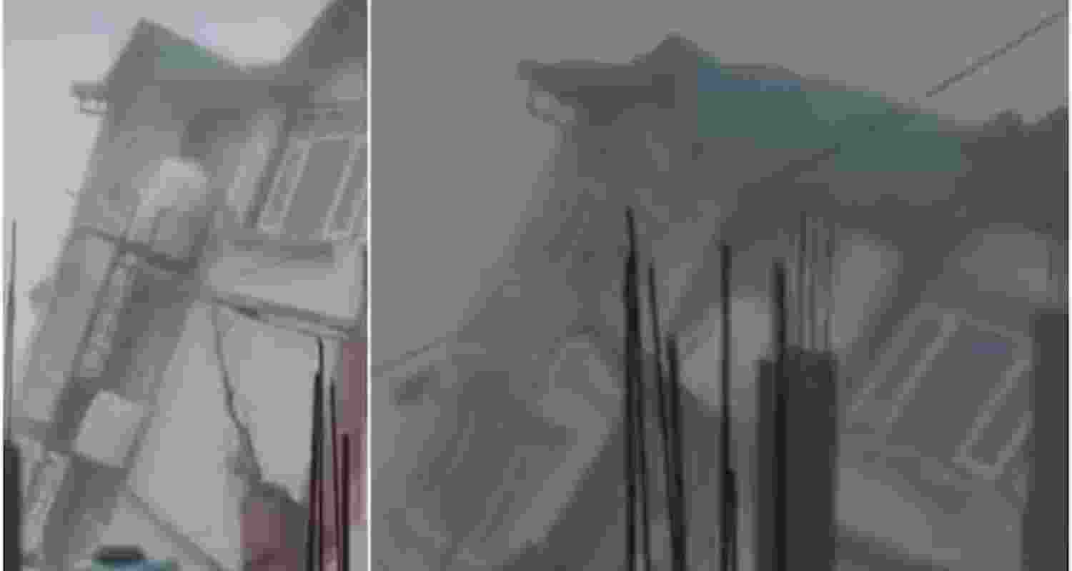 Visuals show the building falling after heavy rains in Shimla. Visuals show the building falling after heavy rains in Shimla.