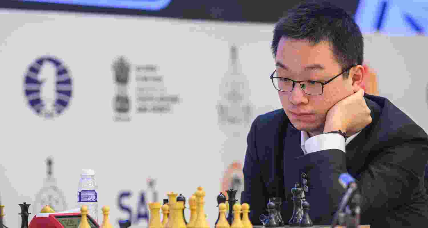 Chinese GM Wei Yi contemplating his next move against GM Javokhir Sindarov in the opening game of the FIDE World Cup final in Panaji on Monday. Chinese GM Wei Yi contemplating his next move against GM Javokhir Sindarov in the opening game of the FIDE World Cup final in Panaji on Monday.