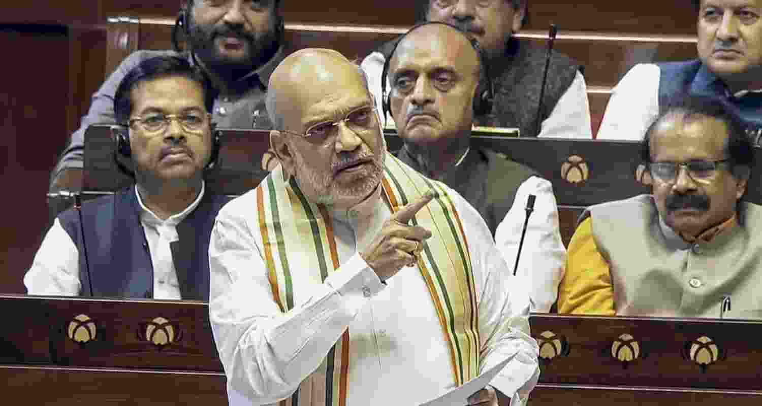 Union Home Minister Amit Shah speaks in the Rajya Sabha during the Budget session of Parliament, in New Delhi, Friday. Union Home Minister Amit Shah speaks in the Rajya Sabha during the Budget session of Parliament, in New Delhi, Friday.